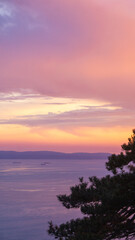 Fototapeta na wymiar Purple sunset over the sea