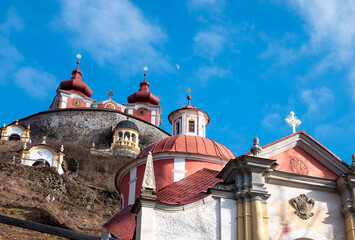 Fototapeta na wymiar Calvary above Banská Štiavnica is one of the most beautiful baroque calvaries in Slovakia and Europe. We can admire its beauty from afar.