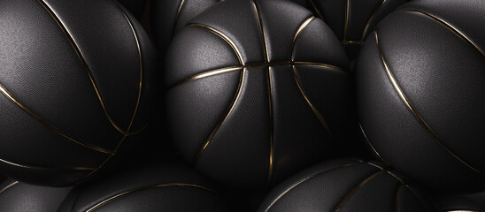 Close-up shot of black and gold basketball The background is black.