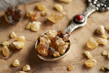 Frankincense resin on a metal spoon