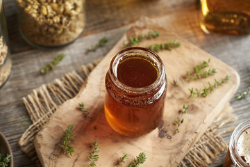 A jar of homemade thyme syrup
