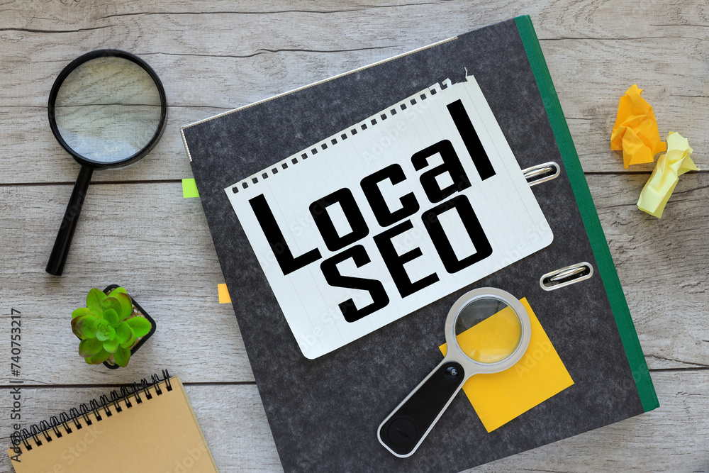 Poster local seo text on a notepad on a gray folder with documents