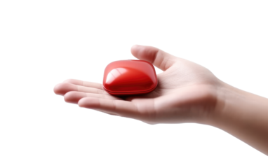 Hand Holding Red Heart Shaped Object. A hand tightly grips a vibrant red heart shaped object, symbolizing love and affection. on White or PNG Transparent Background.