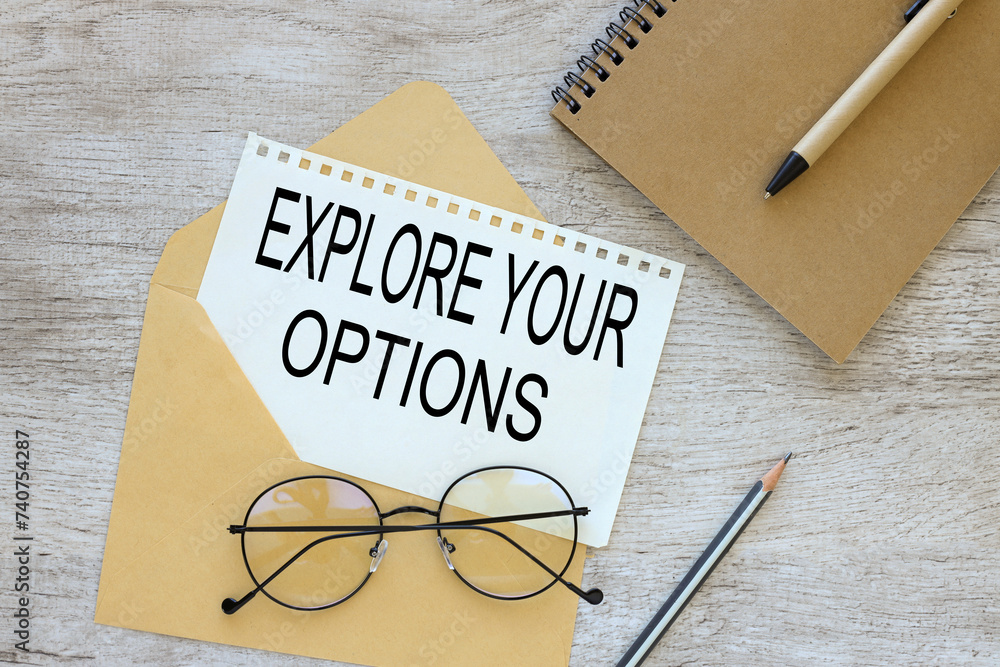 Poster explore your options text on a page from a notepad. envelope page. glasses on a notepad