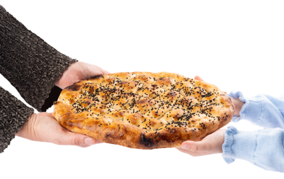 Child and mother holding Turkish cuisine special holy month round Ramadan bread called Ramazan Pide. Delicious bakery product with egg, sesame seeds. Isolated transparent png background.