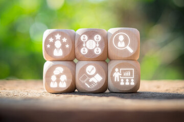 Outplacement concept, Wooden block on desk with outplacement icon on virtual screen.