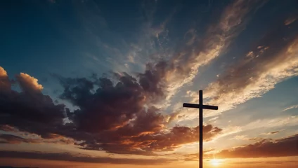 Foto op Plexiglas A heavenly scene - Christian Cross against a radiant sunset sky, symbolizing religious devotion. © xKas