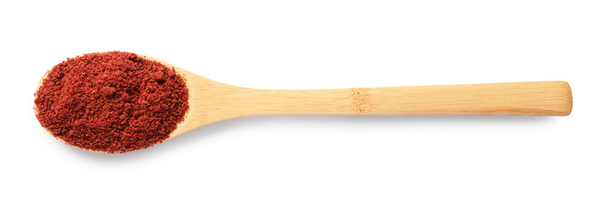 Dried cranberry powder in spoon isolated on white, top view