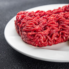 minced meat beef fresh meat tasty eating cooking meal food snack on the table copy space food...