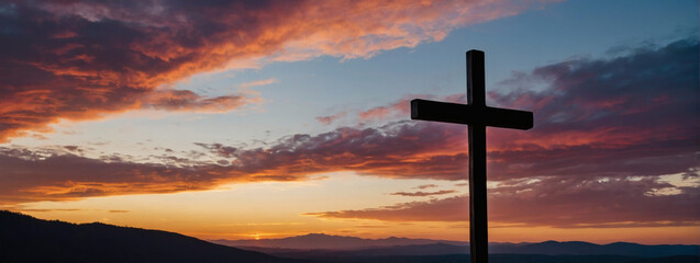 Fototapeta na wymiar Christian symbolism at dusk - The Cross of Jesus against a vibrant and serene sunset background.
