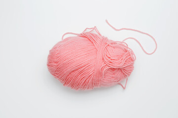 Color yarn for knitting, white background. Top view. Copy space, flat lay