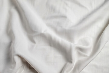 Obraz premium white silk background, satin texture, waving textile