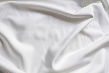 Fototapeta premium white silk background, satin texture, waving textile