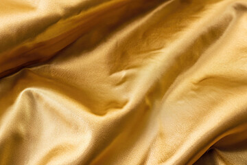 golden silk background, satin texture, waving textile