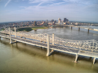 Louisville, is a city on the Ohio River border between Kentucky and Indiana