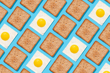 Toast pattern on blue background. Creative food concept, morning breakfast brunch concept. Modern minimal food photography collage
