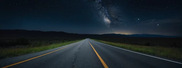 Fototapeten Secluded highway with a deserted asphalt road, embraced by the vast night sky. © xKas