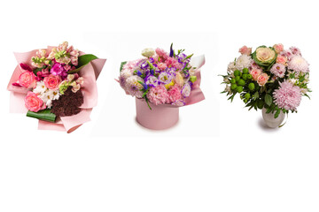 Pink and purple bouquet of flowers in a pink box isolated on white.