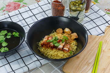 Egg noodles with crispy pork, Asian food style