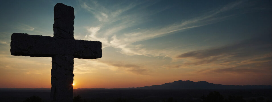 Sunset silhouette of the Cross of Jesus Christ, a poignant representation of Christian faith.