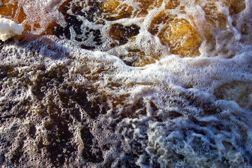 Raging river. Mountain raging river with foaming waves.
