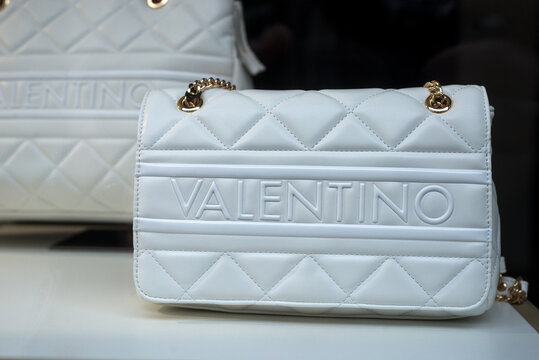 Mulhouse - France - 18 February 2024 - Closeup of white Valentino hand bag in a luxury fashion store showroom