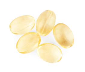 Vitamin capsules isolated on white, top view