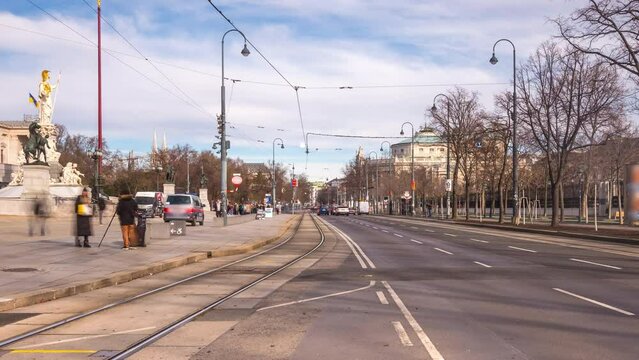 Vienna trafifc cars time lapse in front of The Austrian Parliament Building in Vienna vienna city.