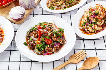 Cockles salad mix vegetable tomato herb and spices Thai style food