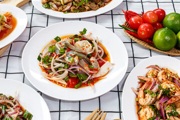 Spicy shrimp salad. Prepared from fresh shrimp, mixed with spicy salad ingredients. Thai Food Menu