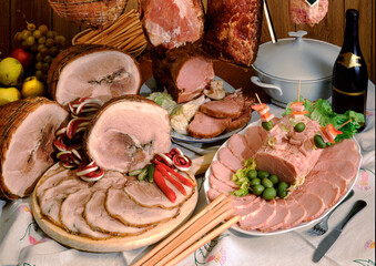 Detail of a table set with cured meats