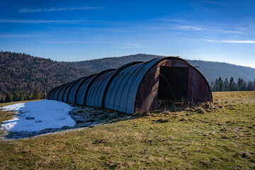 Half cylindrical tin shelter for sheeps in Pieniny Mountains