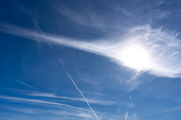 Blue sky Background with aircraft contrails - obrazy, fototapety, plakaty