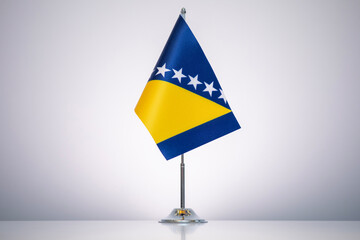 Bosnia and Herzegovina flag with a gray and clean background.