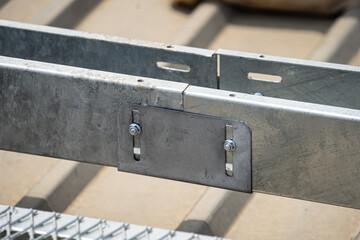 Install the electrical system tray on the roof.