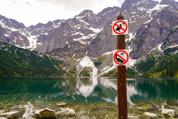 Morskie Oko mountain lake in the Tatras mountains , fishing interdinction sign