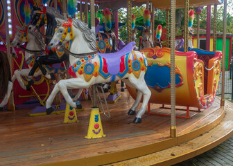 Colorful carousel in atraction park .