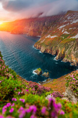 Slieve League or Slieve Liag - A dramatic landscape photo featuring the Slieve League,  The mountain on the Atlantic coast of County Donegal, Ireland. One of the highest sea cliffs in Europe.