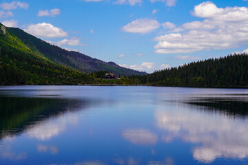 Fototapeta na wymiar Morskie Oko mountain lake panorama , clear water and rocky path