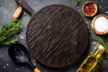 Food background at black kitchen table.