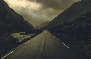 Driving Through Rainy Raw Norwegian Landscape - obrazy, fototapety, plakaty