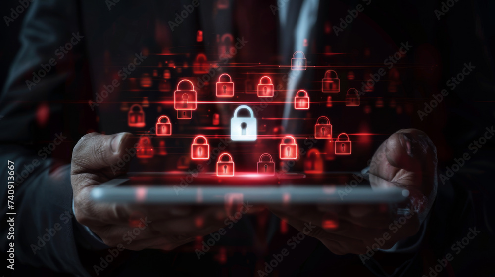 Poster businessman is using a tablet that displays a holographic projection of cybersecurity lock icons, sy