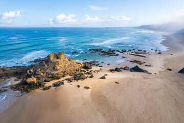 Aerial drone view of Cordoama Beach in Portugal with sandy shore, cliffs and ocean - 740914862