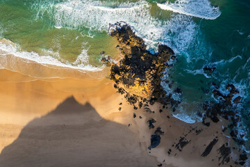 Aerial drone view of Cordoama Beach in Portugal with sandy shore, cliffs and ocean - 740915461