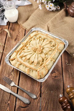 Tatar national pie balish semi-finished product on a wooden background