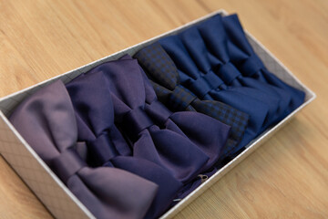 Showcase in a store with beautiful multi-colored bow ties.