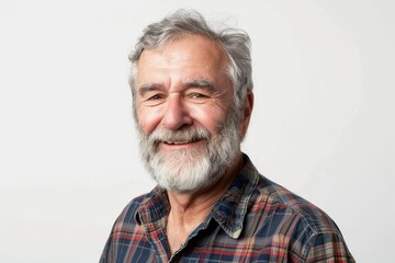 Smiling Senior Man with Beard in Plaid Shirt