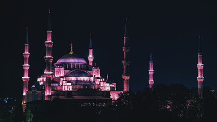 Sultan Ahmed or Blue Mosque at night time with purple lighting. Istanbul, Turkey
