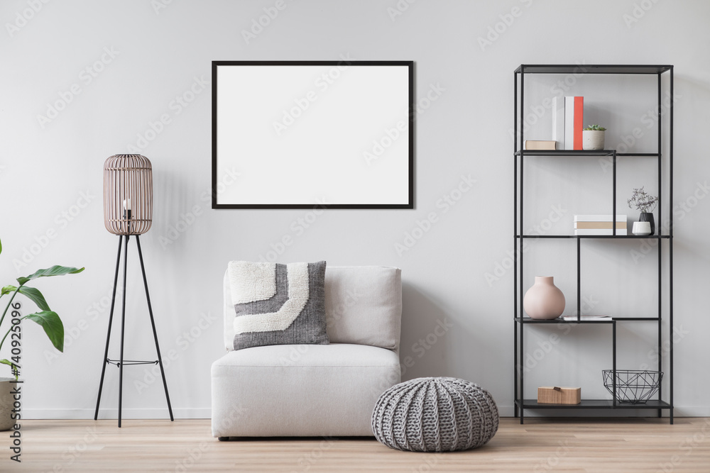 Wall mural Blank picture frame mockup on wall in modern minimalist interior. Artwork template mock up in scandinavian interior design. Home staging and minimalism concept