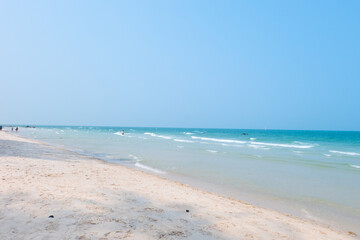 Fototapeta na wymiar Blue sea with white sand in summer.